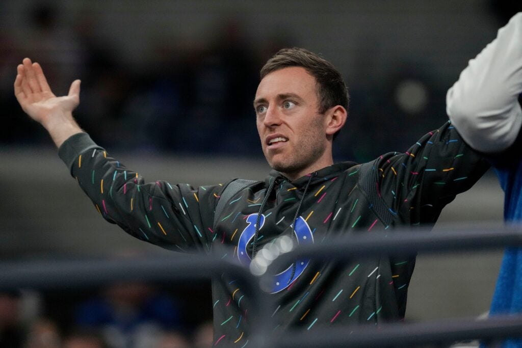 Colts fan sharing a reaction inside of Lucas Oil Stadium