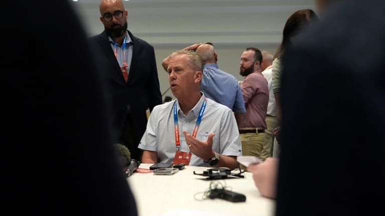 Cleveland Browns head coach Todd Monken speaks with reporters at...