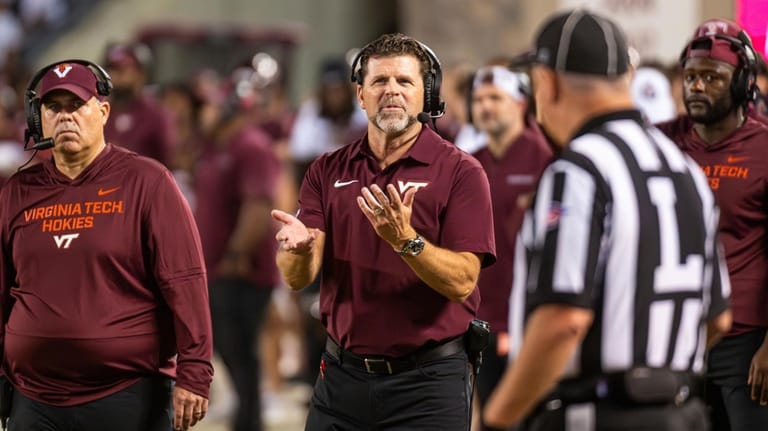 Virginia Tech head coach Brent Pry on the sidelines against...