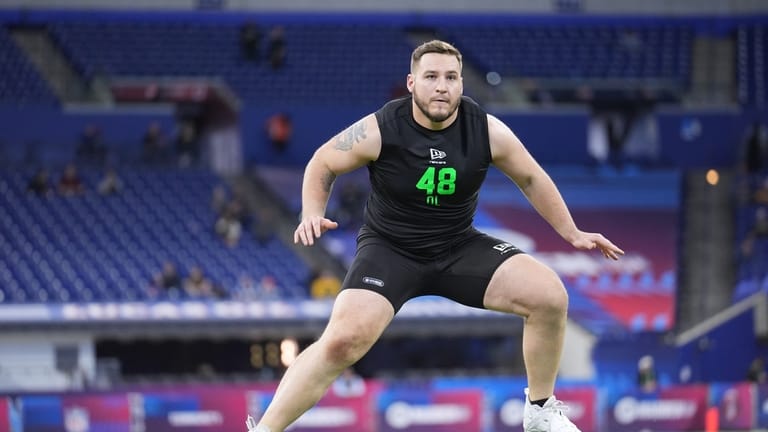 Iowa offensive lineman Beau Stephens (48) runs a drill at...