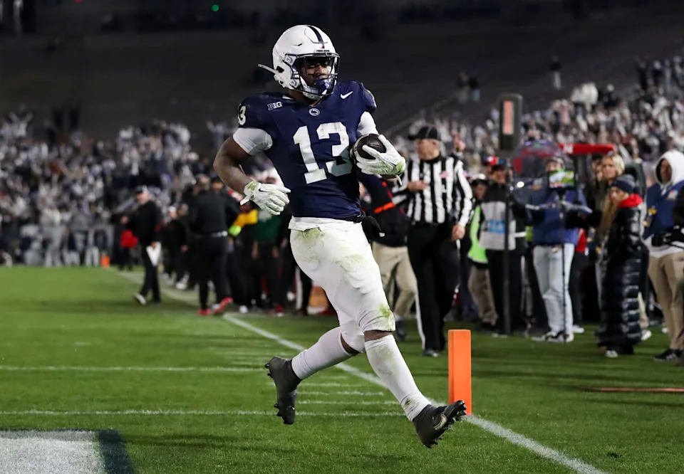 Nov 22, 2025; University Park, Pennsylvania, USA; Penn State Nittany Lions running back Kaytron Allen (13) runs the ball into the end zone for a touchdown during the fourth quarter against the Nebraska Cornhuskers at Beaver Stadium. Mandatory Credit: Matthew O'Haren-Imagn Images