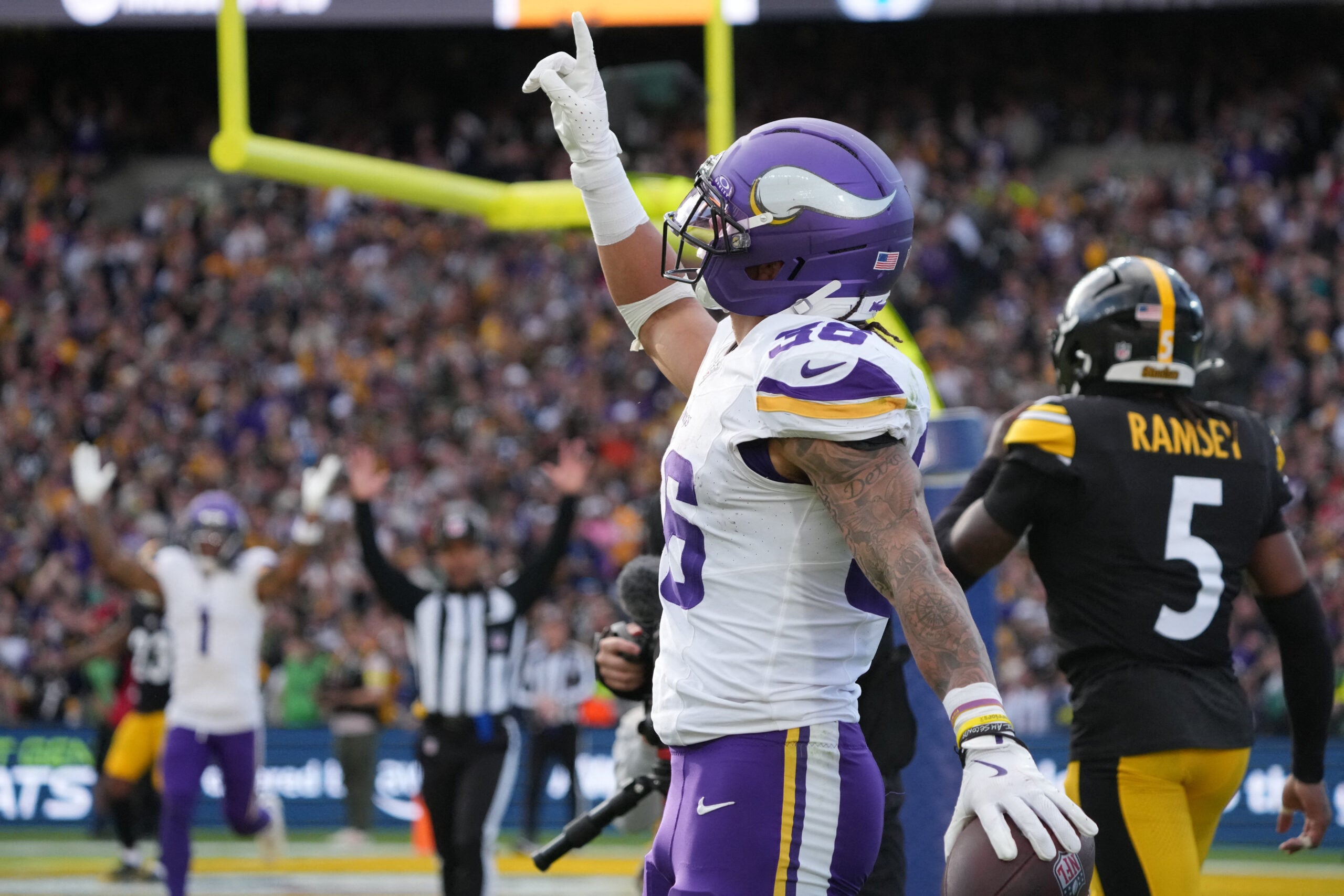 Sep 28, 2025; Dublin, Ireland; Minnesota Vikings running back Zavier Scott (36) reacts after catching a touchdown past during the fourth quarter against the Pittsburgh Steelers during an NFL International Series game at Croke Park.