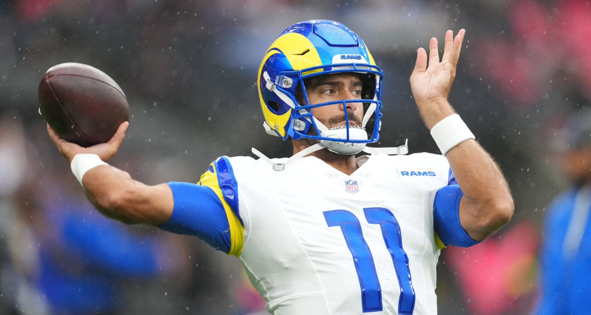 Oct 19, 2025; London, United Kingdom; Los Angeles Rams quarterback Jimmy Garoppolo (11) warms up before a NFL International Series game between the Los Angeles Rams and the Jacksonville Jaguars at Wembley Stadium.