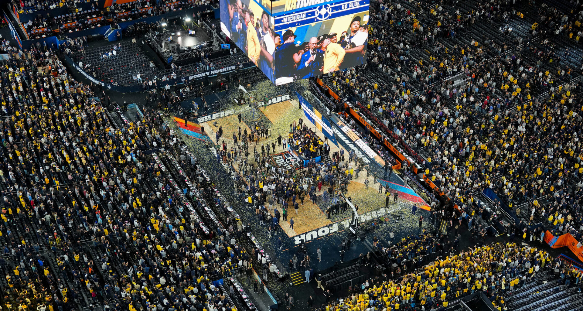 Michigan celebrates after defeating UConn in the national championship game at the Final Four on Monday, April 6, in Indianapolis.