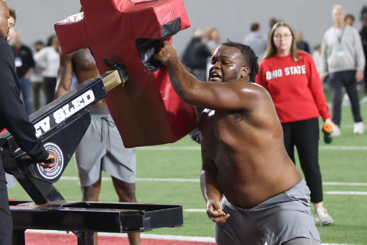 Ohio State defensive lineman Kayden McDonald participates in a drill during the school's N ...