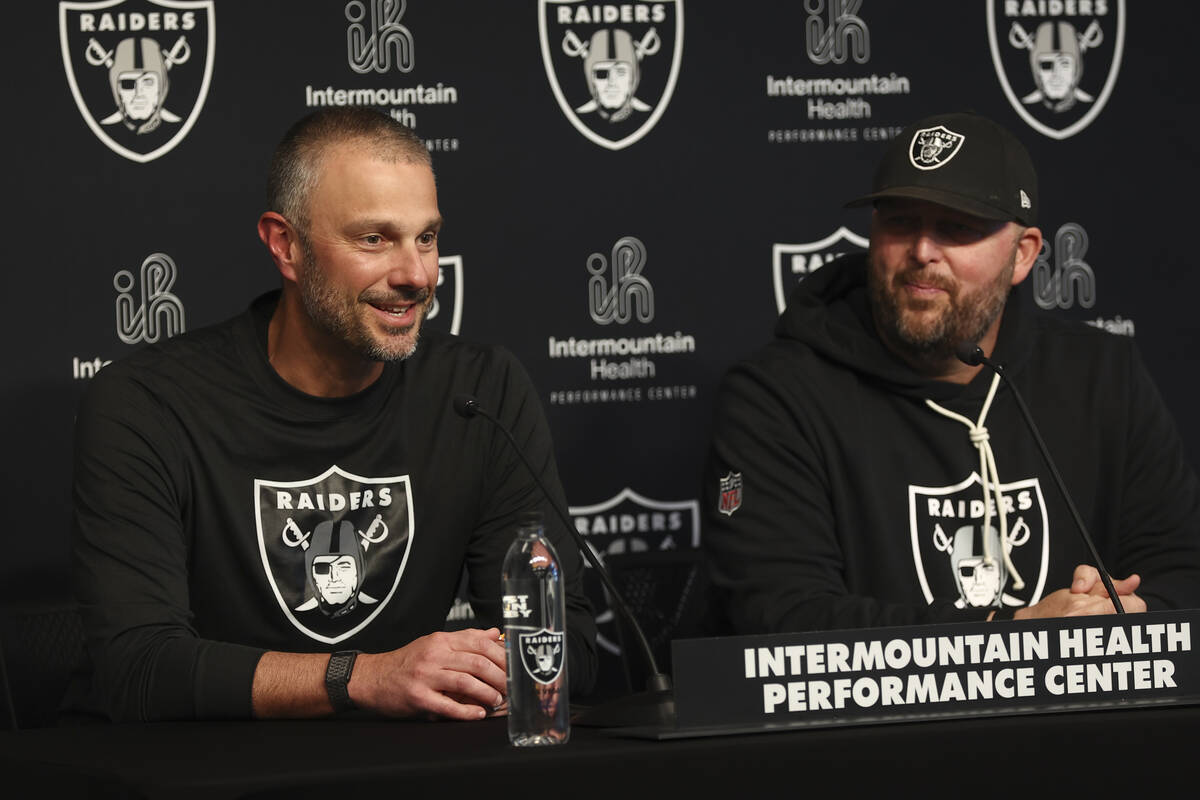 Raiders general manager John Spytek, left, speaks alongside Brian Stark, assistant general mana ...