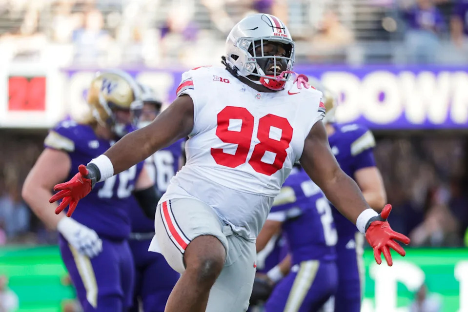Sep 27, 2025; Seattle, Washington, USA; Ohio State Buckeyes defensive lineman Kayden McDonald (98) celebrates a sack against the Washington Huskies during the fourth quarter at Husky Stadium. Mandatory Credit: Joe Nicholson-Imagn Images