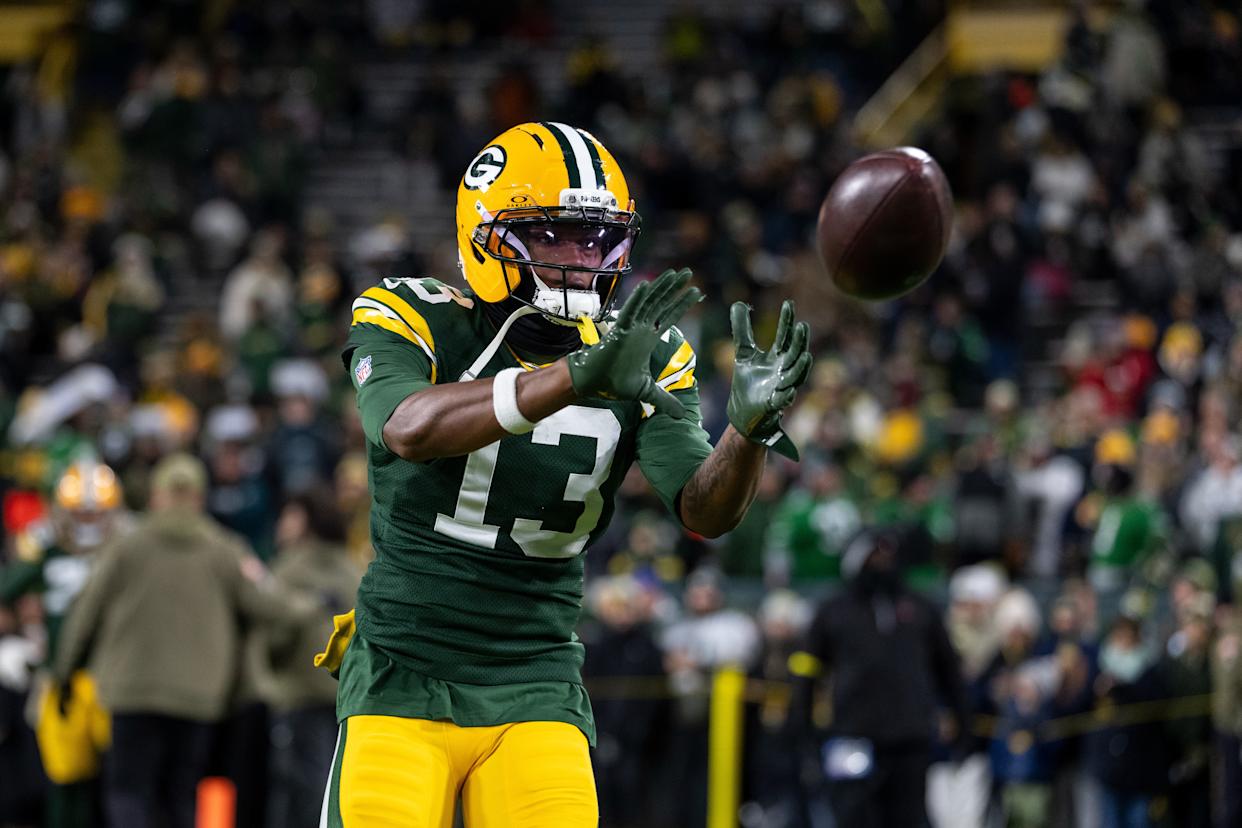 Dontayvion Wicks #13 of the Green Bay Packers completes a catch prior to an NFL football game against the Philadelphia Eagles at Lambeau Field on November 10, 2025 in Green Bay, Wisconsin.
