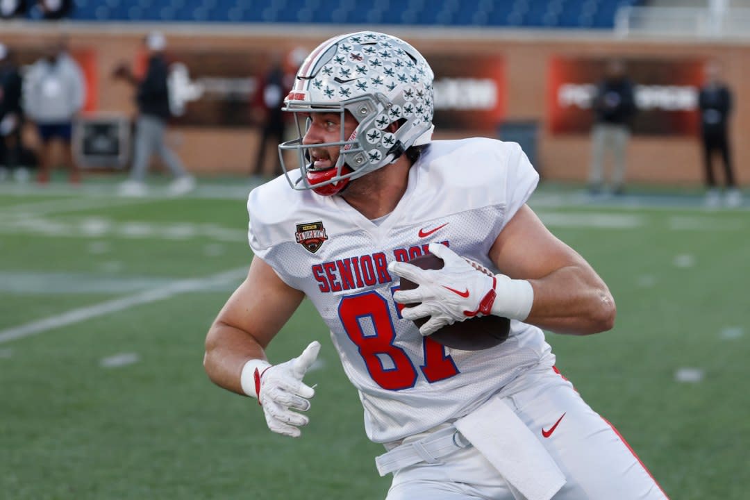 American Team tight end Will Kacmarek (87), of Ohio State, runs through drills during practice for the Senior Bowl NCAA college football game Wednesday, Jan. 28, 2026, in Mobile, Ala. (AP Photo/Butch Dill)