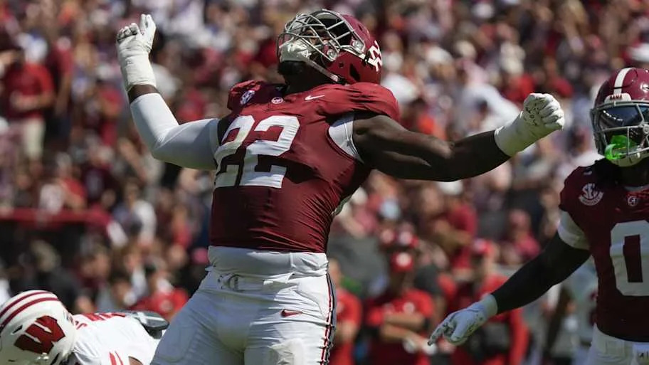 Alabama defensive lineman LT Overton celebrates after sacking Wisconsin quarterback Danny O'Neil.