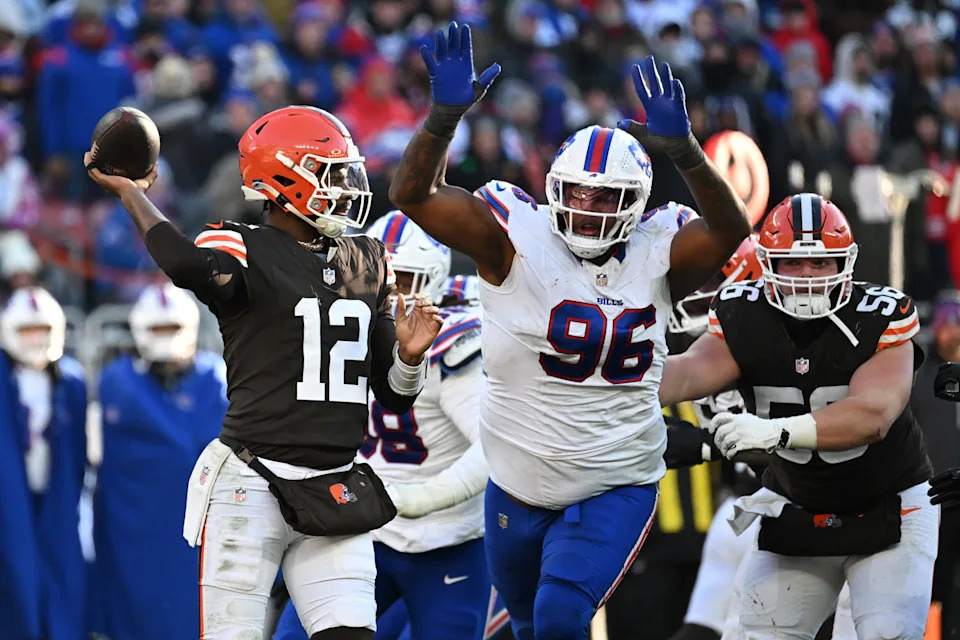 Dec 21, 2025; Cleveland, Ohio, USA; Buffalo Bills defensive tackle Deone Walker (96)v applies pressure on Cleveland Browns quarterback Shedeur Sanders (12) during the second half at Huntington Bank Field. Mandatory Credit: Ken Blaze-Imagn Images
