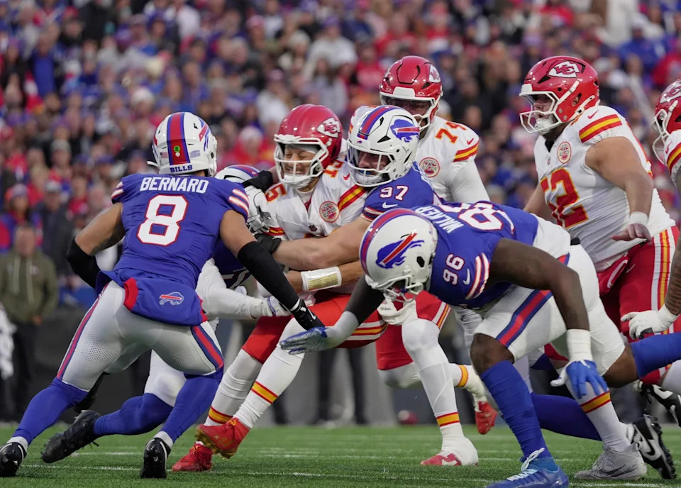 Buffalo Bills defensive end Joey Bosa sacks Kansas City Chiefs quarterback Patrick Mahomes with linebacker Terrel Bernard coming in to help during first half action against the Kansas City Chiefs at Highmark Stadium in Orchard Park on Nov. 2, 2025.