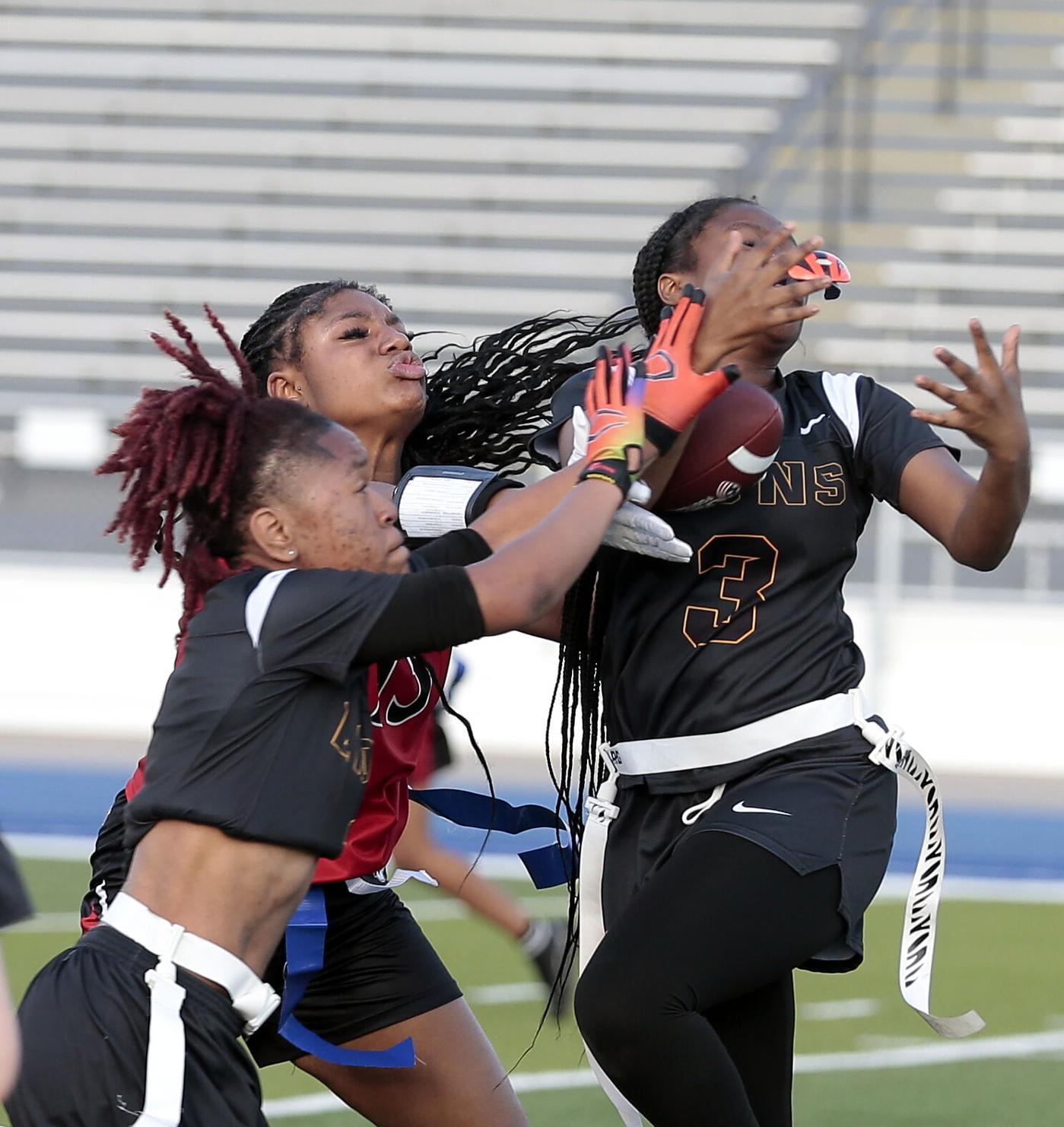 Meadowdale’s Ayana White intercepts a pass during a girls flag football game Thursday, April 9, 2026, at Welcome Stadium. STEVEN WRIGHT / STAFF