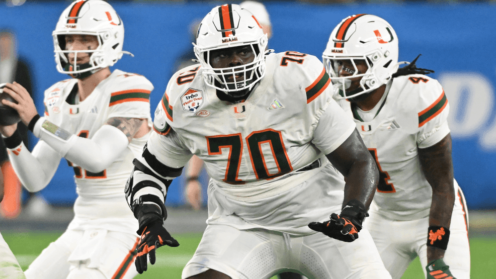 Markel Bell #70 of the Miami Hurricanes pass blocks against the Ole Miss Rebels during the 2025 College Football Playoff Semifinal at the VRBO Fiesta Bowl at State Farm Stadium on January 08, 2026 in Glendale, Arizona. (Photo by Norm Hall/Getty Images)