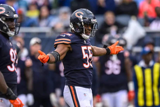 Sep 11, 2022; Chicago, Illinois, USA; Chicago Bears defensive tackle Al-Quadin Muhammad (55) motions to fans in the fourth quarter against the San Francisco 49ers at Soldier Field. Mandatory Credit: Daniel Bartel-USA TODAY Sports