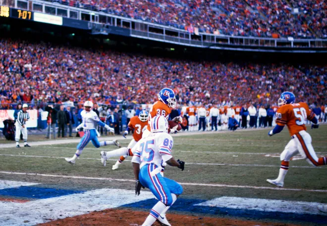 Jan 10, 1988; Denver, CO, USA; FILE PHOTO; Denver Broncos defensive back Mark Haynes (36) intercepts a pass against the Houston Oilers during the 1987 AFC Divisional Playoff game at Mile High Stadium. The Broncos defeated Oliers 34-10. Mandatory Credit: USA TODAY Sports