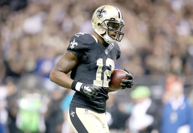 NEW ORLEANS, LA - NOVEMBER 01: Marques Colston #12 of the New Orleans Saints runs for a touchdown against the New York Giants during their game at the Mercedes-Benz Superdome on November 1, 2015 in New Orleans, Louisiana. (Photo by Sean Gardner/Getty Images)