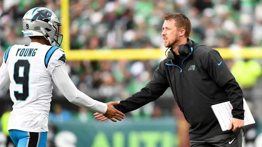 Carolina Panthers quarterback Bryce Young (9) and offensive coordinator Brad Idzik 