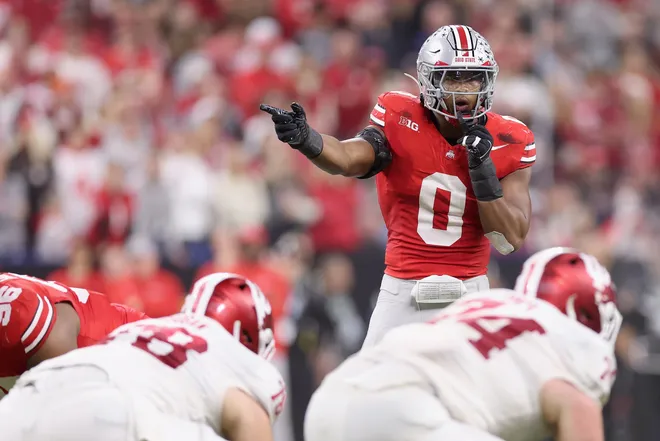 INDIANAPOLIS, INDIANA - DECEMBER 06: Sonny Styles #0 of the Ohio State Buckeyes reacts at the line of scrimmage against the Indiana Hoosiers during the second quarter in the 2025 Big Ten Football Championship at Lucas Oil Stadium on December 06, 2025 in Indianapolis, Indiana. (Photo by Michael Reaves/Getty Images)