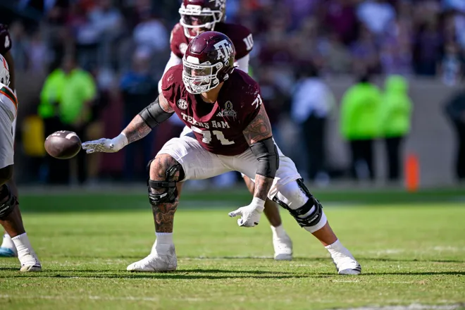 Dec 20, 2025; College Station, TX, USA; Texas A&M Aggies offensive lineman Chase Bisontis (71) blocks the rush during the game between the Aggies and the Hurricanes at Kyle Field. Mandatory Credit: Jerome Miron-Imagn Images
