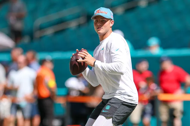 Sep 14, 2025; Miami Gardens, Florida, USA; Miami Dolphins quarterback Zach Wilson (0) warms up before a game against the New England Patriots at Hard Rock Stadium. Mandatory Credit: Nathan Ray Seebeck-Imagn Images