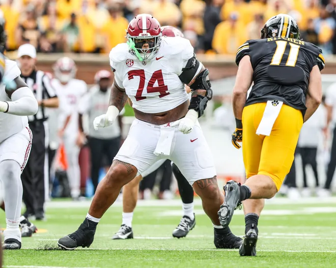 Oct 11, 2025; Columbia, Missouri, USA; Alabama Crimson Tide offensive lineman Kadyn Proctor (74) plays in their game with the Missouri Tigers at Faurot Field at Memorial Stadium. Mandatory Credit: Reese Strickland-Imagn Images