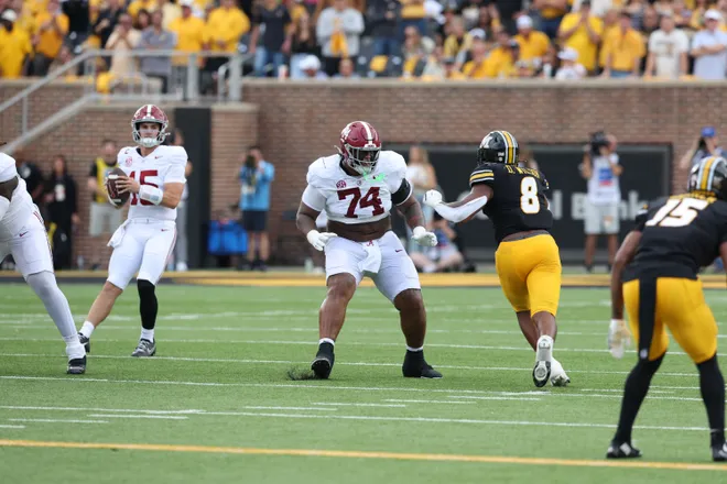 Oct 11, 2025; Columbia, Missouri, USA; Alabama Crimson Tide offensive lineman Kadyn Proctor (74) plays in their game with the Missouri Tigers at Faurot Field at Memorial Stadium. Mandatory Credit: Reese Strickland-Imagn Images