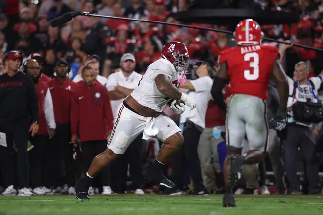 Sep 27, 2025; Athens, Georgia, USA; Alabama Crimson Tide offensive lineman Kadyn Proctor (74) runs against the Georgia Bulldogs in the second quarter at Sanford Stadium. Mandatory Credit: Brett Davis-Imagn Images