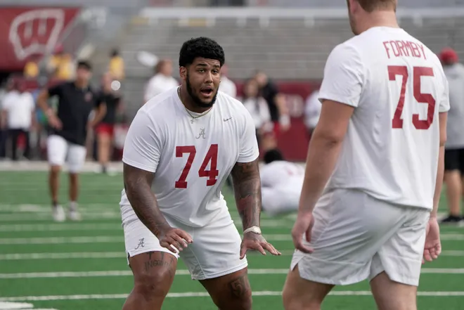 Sep 14, 2024; Madison, Wisconsin, USA; Alabama Crimson Tide offensive lineman Kadyn Proctor (74) is shown before a game against the Wisconsin Badgers at Camp Randall Stadium. Mandatory Credit: ?Mark Hoffman/USA TODAY Network via Imagn Images