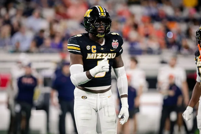 Dec 27, 2025; Jacksonville, FL, USA; Missouri Tigers defensive end Zion Young (9) looks on before a play against the Virginia Cavaliers in the first half at EverBank Stadium. Mandatory Credit: Travis Register-Imagn Images