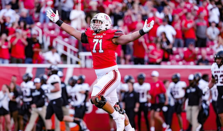 Utah offensive tackle Caleb Lomu celebrates a big play during game against
Southern Utah at Rice-Eccles Stadium in Salt Lake City, Utah, on Thursday, Aug. 29, 2024.