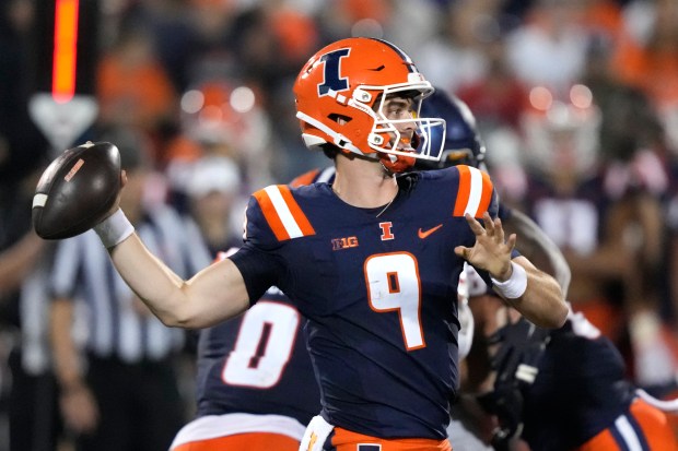 Illinois quarterback Luke Altmyer passes during a game against Toledo on Saturday, Sept. 2, 2023, in Champaign, Ill. (AP Photo/Charles Rex Arbogast)