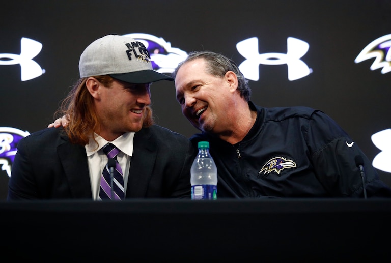 Baltimore Ravens offensive coordinator Marty Mornhinweg, right, speaks with tight end Hayden Hurst, one of the Ravens' first-round draft picks, during an NFL football news conference at the team's headquarters in Owings Mills, Md., Friday, April 27, 2018.