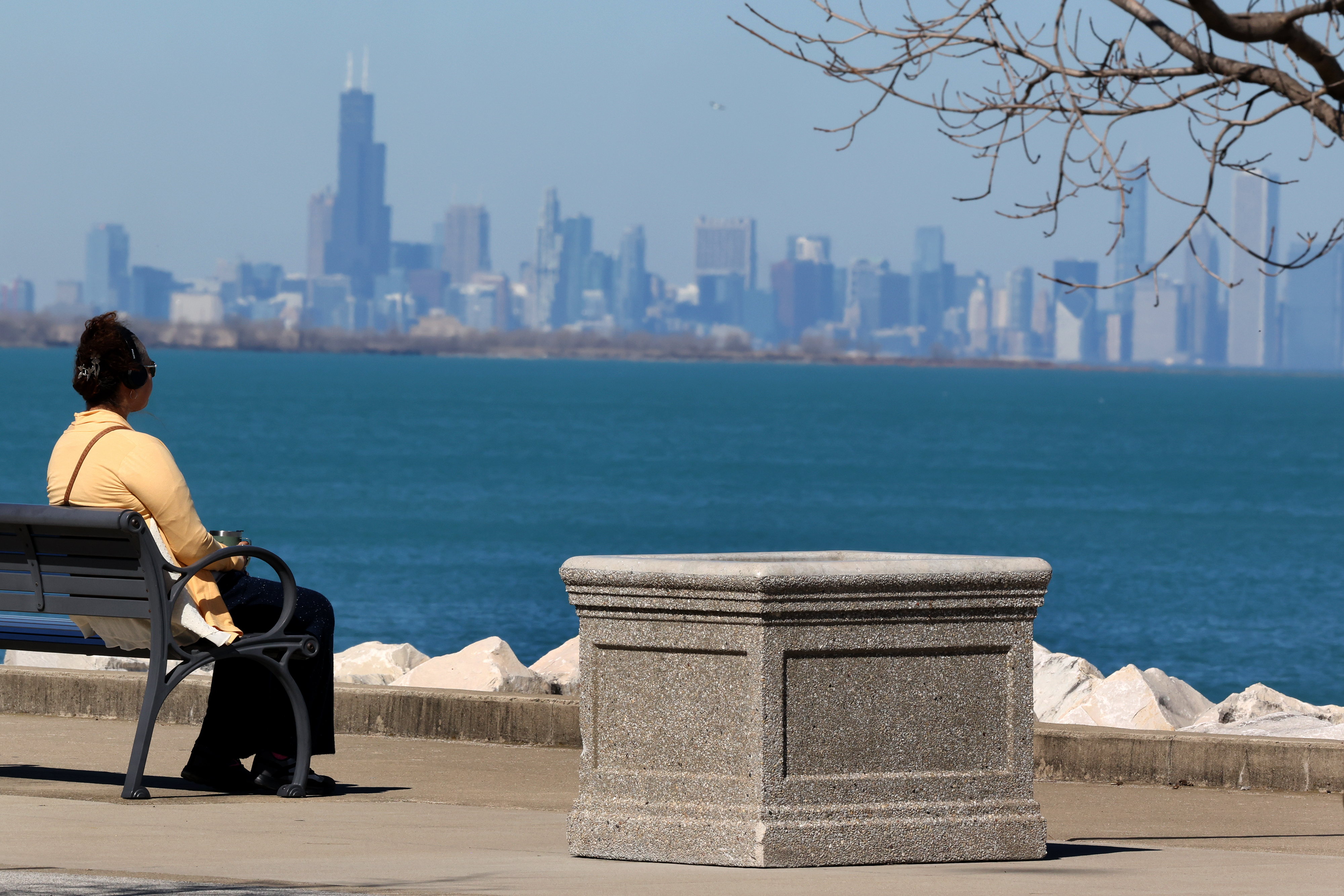 A womanat Whihala Beach in Whiting Indiana, gets a view...