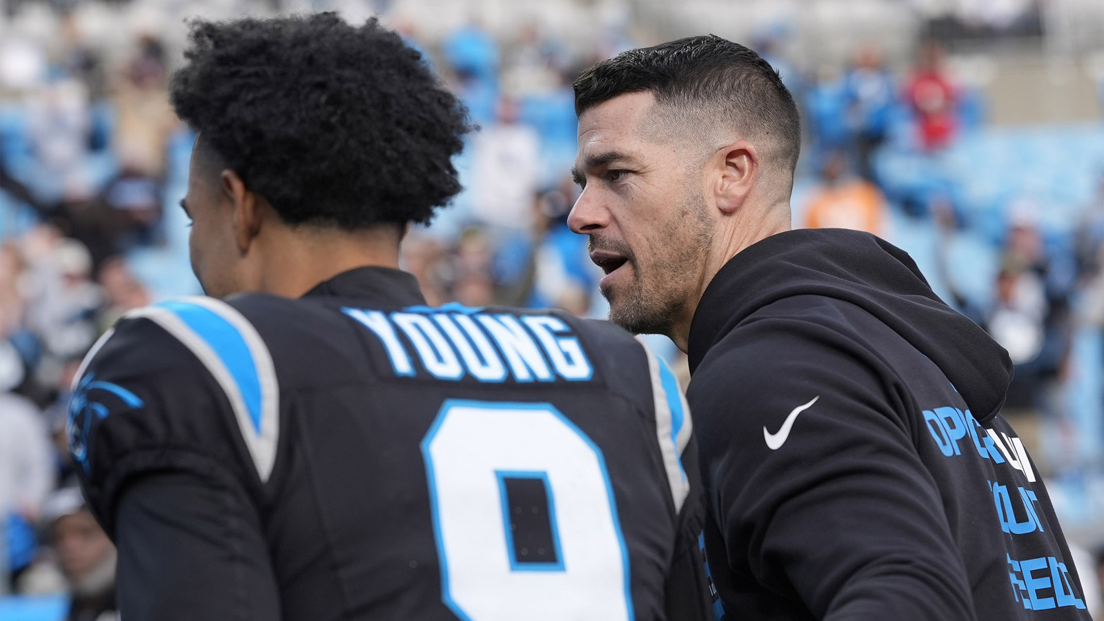 Carolina Panthers head coach Dave Canales greets quarterback Bryce Young (9) after a win against the Tampa Bay Buccaneers at Bank of America Stadium.