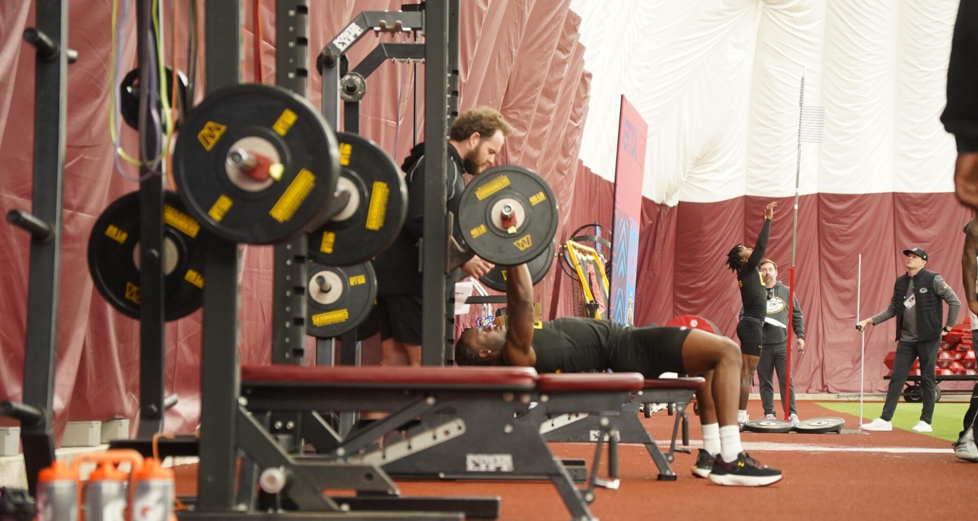 Morgan State's Erick Hunter completes 16 repetitions on the bench press during the HBCU Showcase on March 30, 2026, at the Washington Commanders' practice facility in Ashburn, Va.