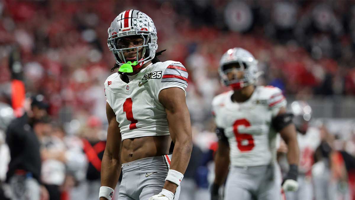Jan 20, 2025; Atlanta, GA, USA; Ohio State Buckeyes cornerback Davison Igbinosun (1) reacts after a play against the Notre Dame Fighting Irish during the first half the CFP National Championship college football game at Mercedes-Benz Stadium. Mandatory Credit: Brett Davis-Imagn Images