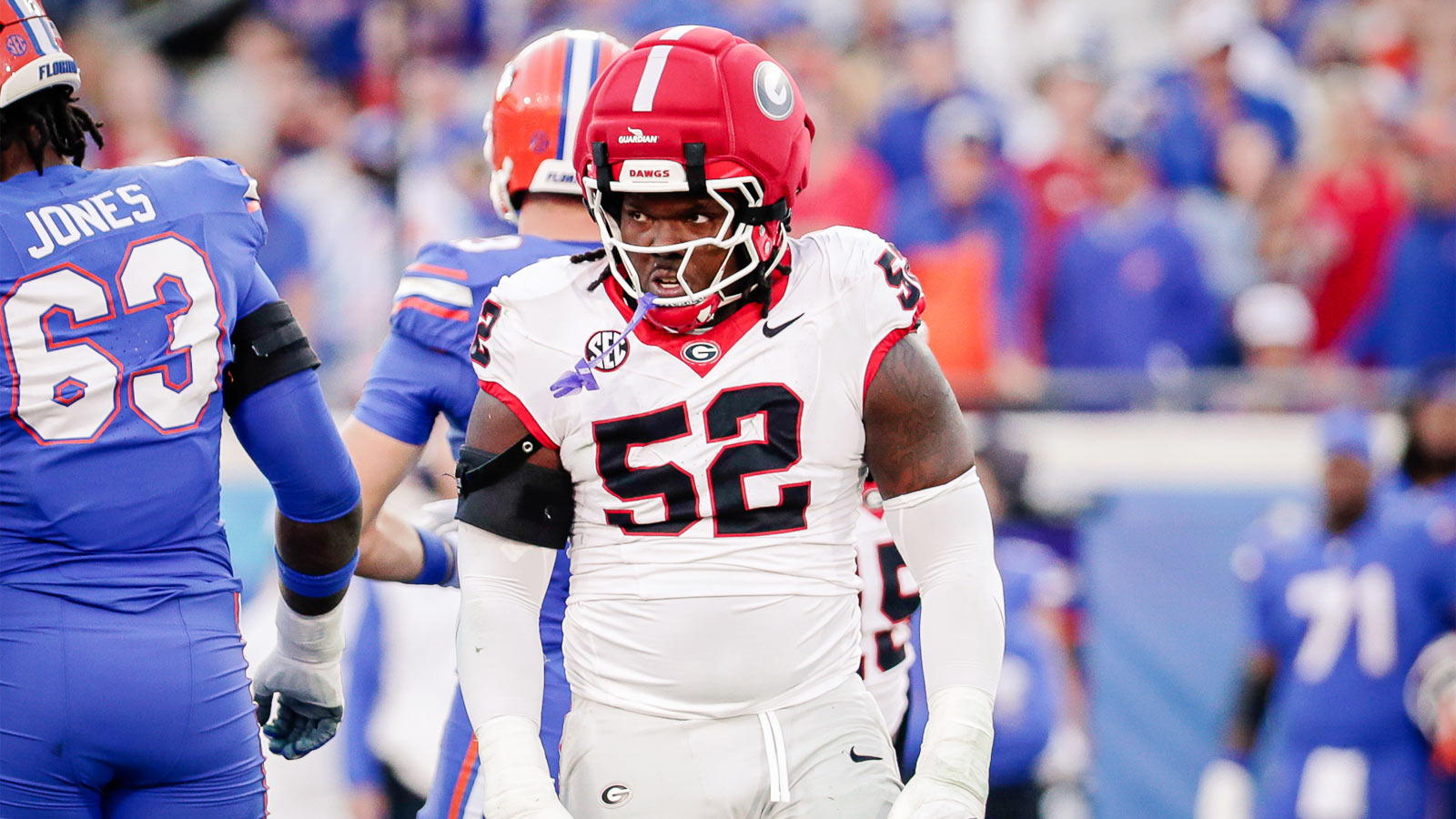 Georgia Bulldogs defensive lineman Christen Miller (52) reacts after making a tackle against the Florida Gators at EverBank Stadium.