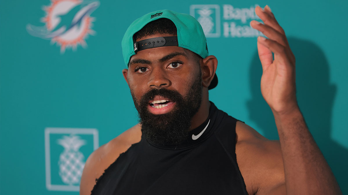 Dolphins linebacker Jordyn Brooks (20) speaks to reporters during training camp at Baptist Health Training Complex with Colts running back Jonathan Taylor in the background