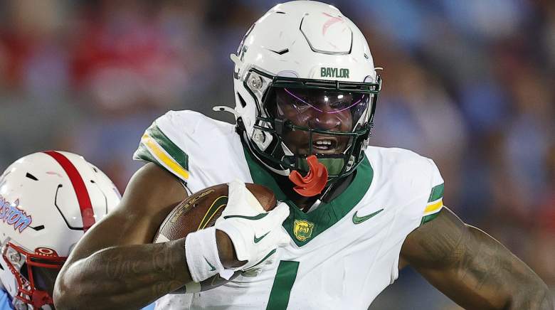 Michael Trigg #1 of the Baylor Bears worked out with Cowboys coach Lunda Wells.