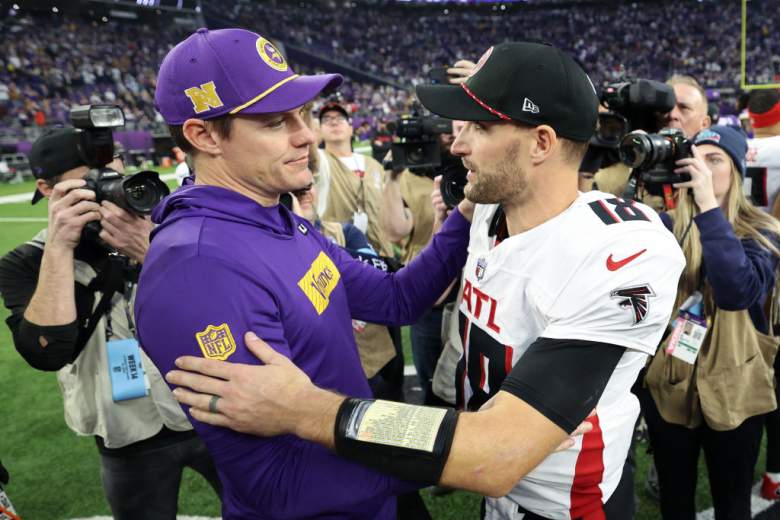 Atlanta Falcons QB Kirk Cousins (right) talks with Minnesota Vikings head coach Kevin O'Connell (left)