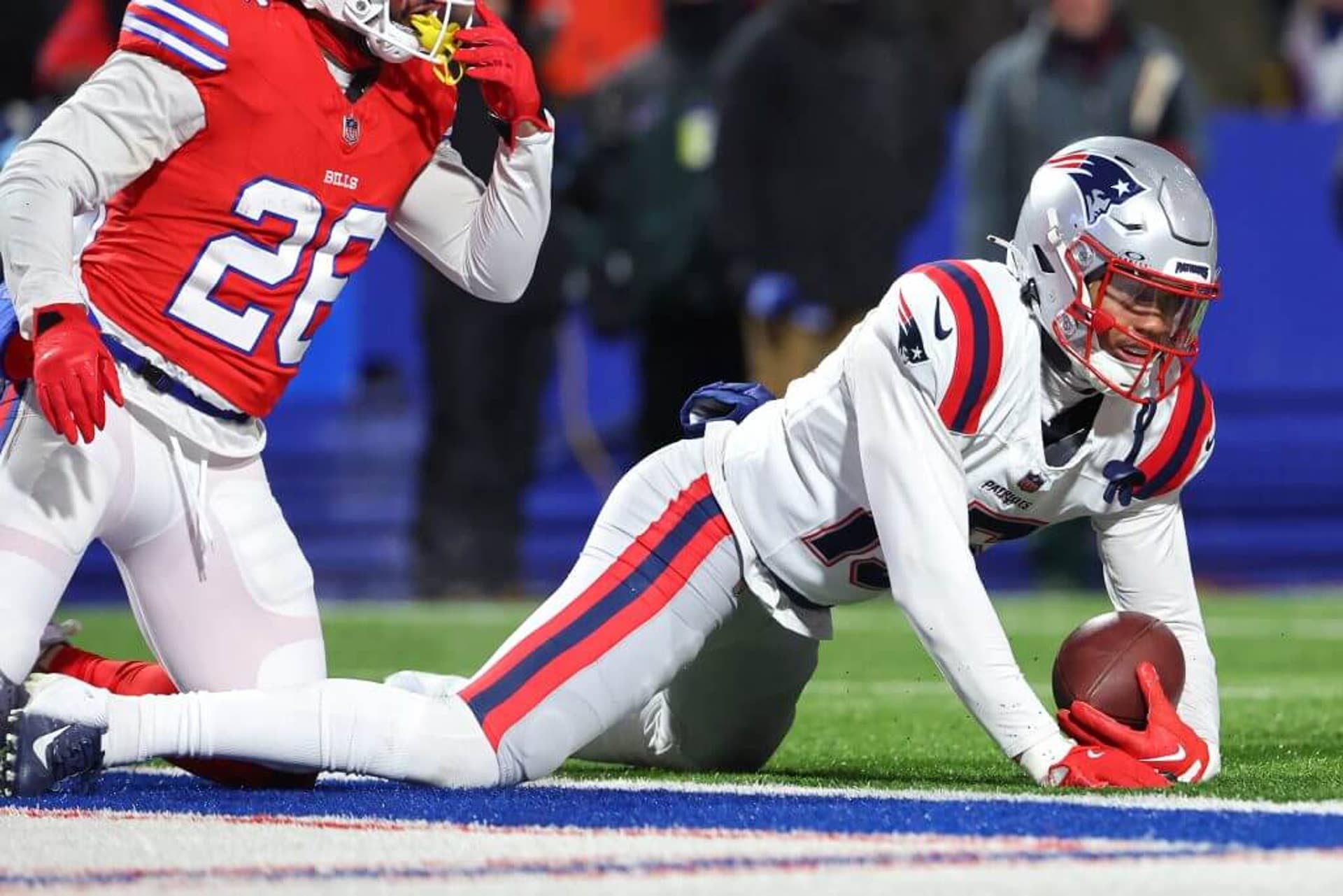 Marte Mapu of the New England Patriots intercepts the ball against the Buffalo Bills during the second quarter at Highmark Stadium on Dec. 22, 2024 in Orchard Park, N.Y.