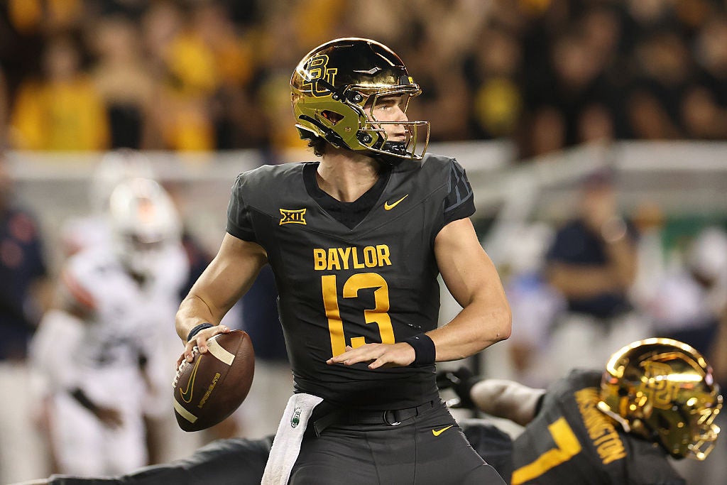 WACO, TEXAS - AUGUST 29: Sawyer Robertson #13 of the Baylor Bears drops back to pass during the second half of a game against the Auburn Tigers at McLane Stadium on August 29, 2025 in Waco, Texas. (Photo by Stacy Revere/Getty Images)