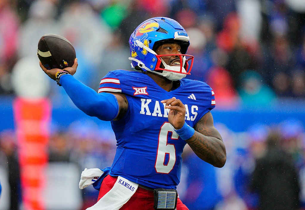 LAWRENCE, KANSAS - OCTOBER 25: Jalon Daniels #6 of the Kansas Jayhawks throws a pass during the first half against the Kansas State Wildcats at David Booth Kansas Memorial Stadium on October 25, 2025 in Lawrence, Kansas.