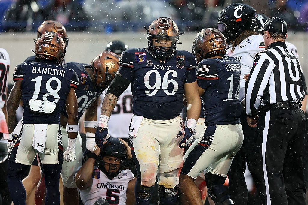 MEMPHIS, TENNESSEE - JANUARY 02: Landon Robinson #96 of the Navy Midshipmen reacts during the first half of the 2026 AutoZone Liberty Bowl against the Cincinnati Bearcats at Simmons Bank Liberty Stadium on January 02, 2026 in Memphis, Tennessee. (Photo by Justin Ford/Getty Images)