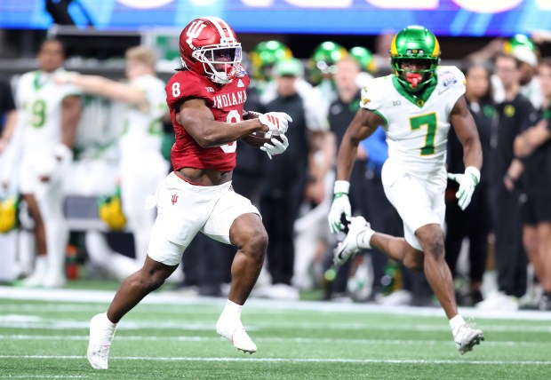Kaelon Black of the Indiana Hoosiers rushes against the Oregon Ducks during the third quarter of the 2025 College Football Playoff Semifinal at the Chick-fil-A Peach Bowl at Mercedes-Benz Stadium on January 09, 2026 in Atlanta, Georgia. (Photo by Kevin C. Cox/Getty Images)