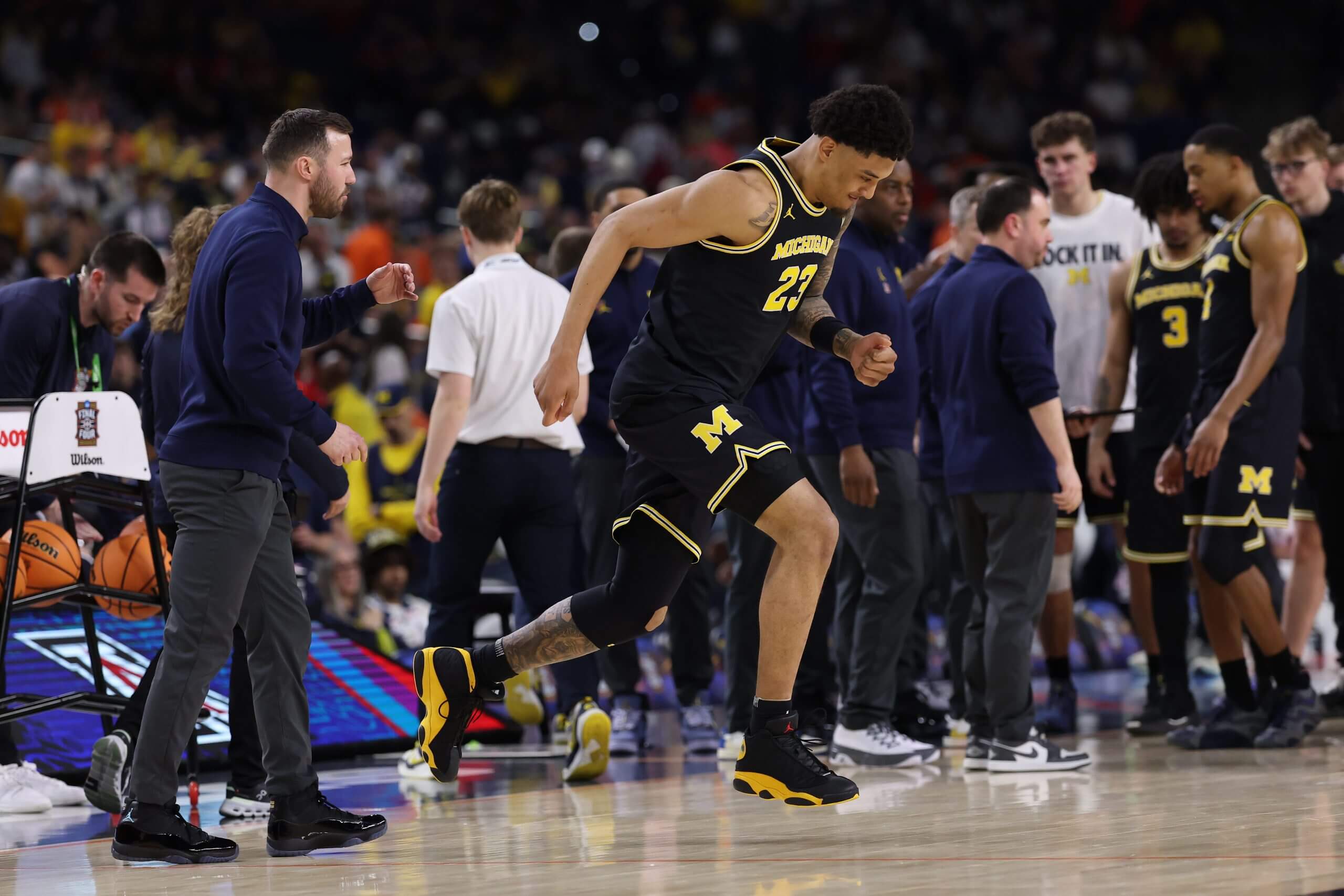 Yaxel Lendeborg jumps in the air.