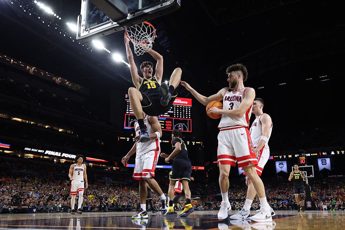 Michigan pummels Arizona to roll into national championship game against UConn