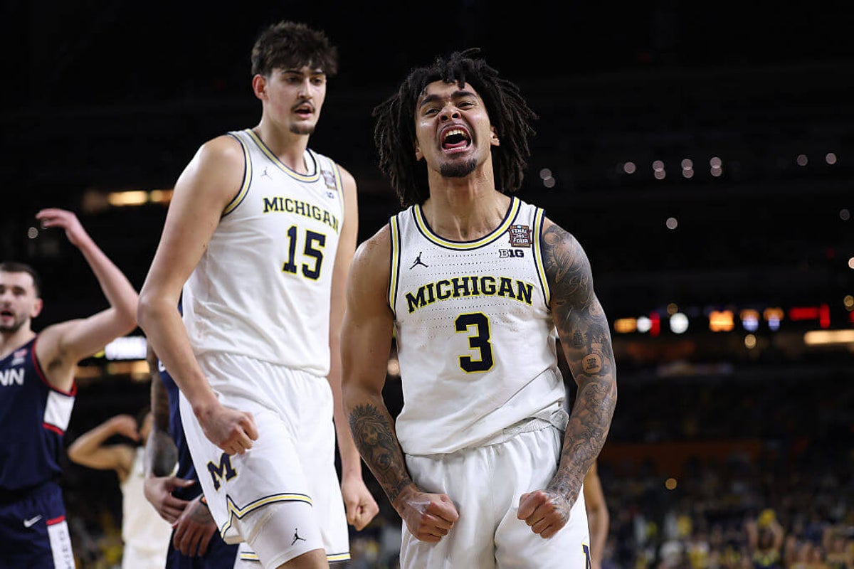 Michigan fends off UConn to win first national championship since 1989