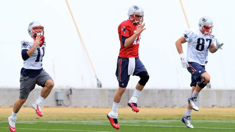 Tom Brady, Rob Gronkowski and Julian Edelman warm up at New England Patriots practice